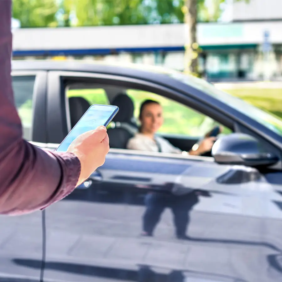 Rideshare driver picking up their passenger.