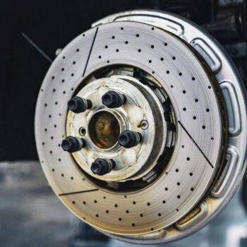 Exposed disk brake on lifted car