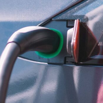 Electric car charger charging car