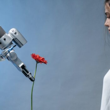 machine learns how to give single flower to woman