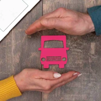 two hands around a truck image shape