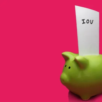 piggy bank with IOU instead of payment