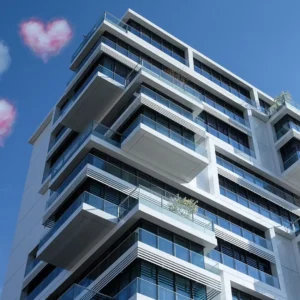 Low angle of condo on a blue sky