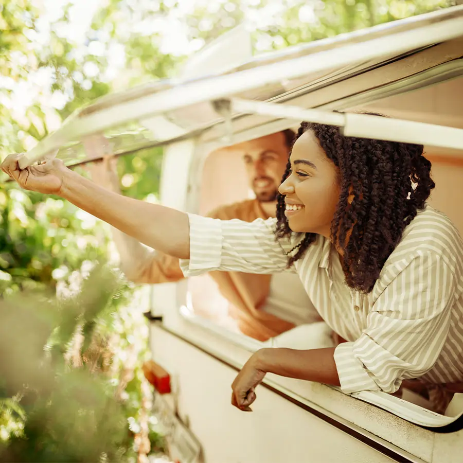 Couple camping in their RV.