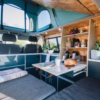 kitchenette in RV with loaf of bread on table