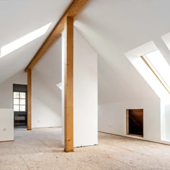 freshly drywalled room with exposed beam