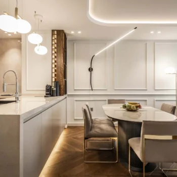 kitchen and dining room with modern light fixtures