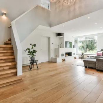 living room with hardwood flooring and white walls