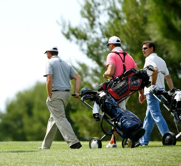 golfers walking the course with golf gear