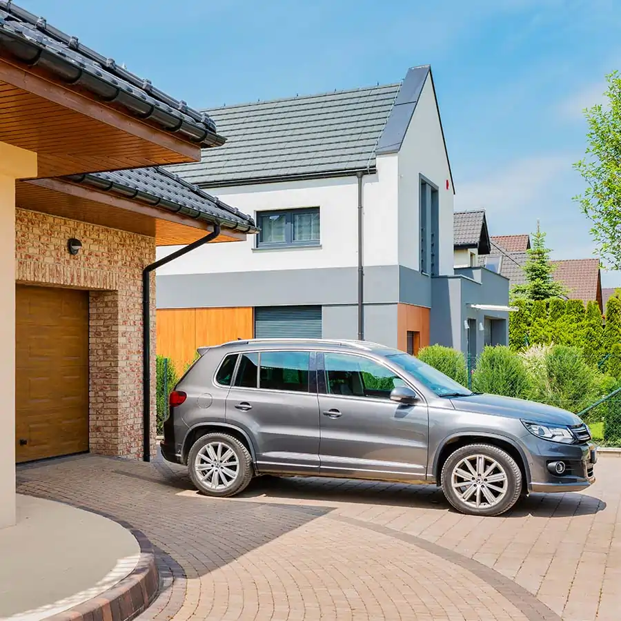 Car parked in a driveway.