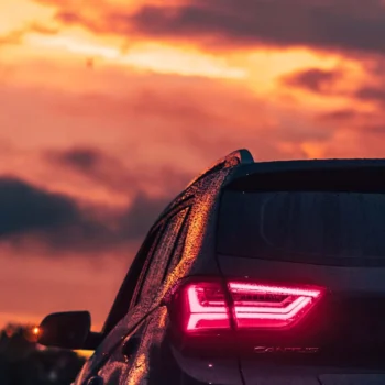 Back of a Hyundai SUV at sunset.