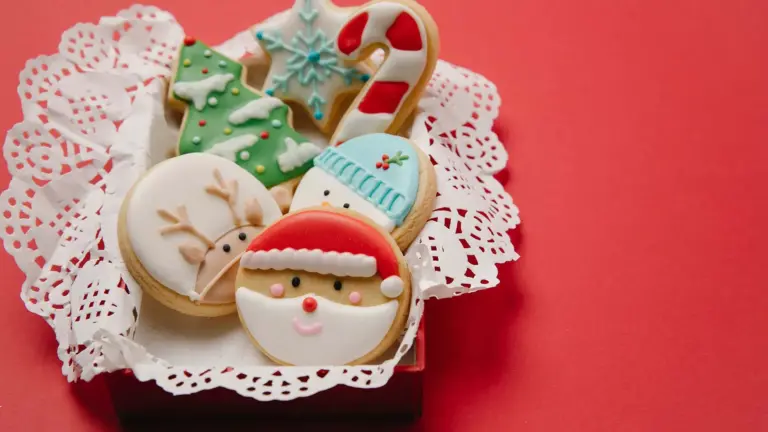 Basket of decorated holiday sugar cookies.