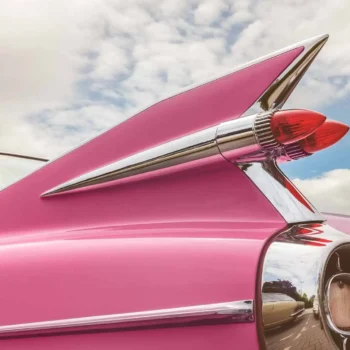 Pink vintage car on a sunny day.