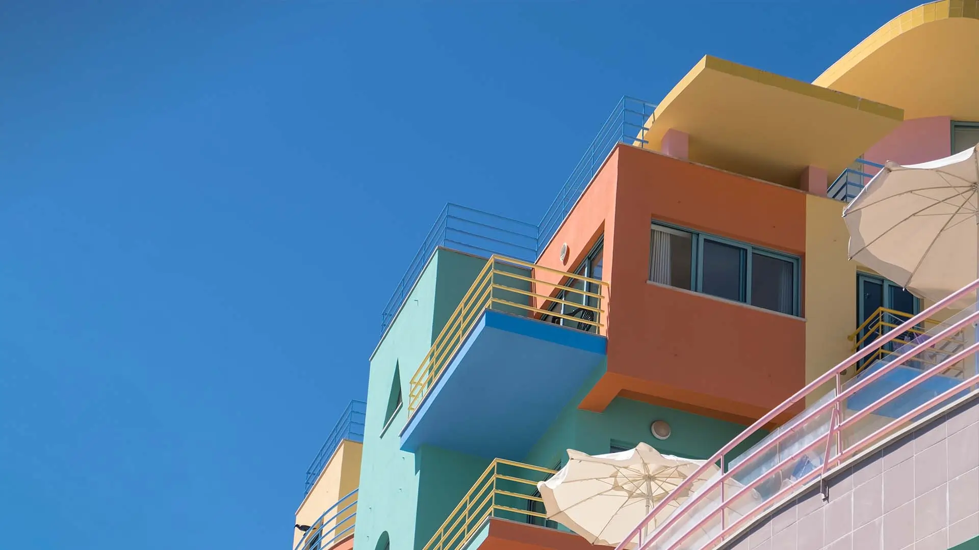 Colourful condo building.