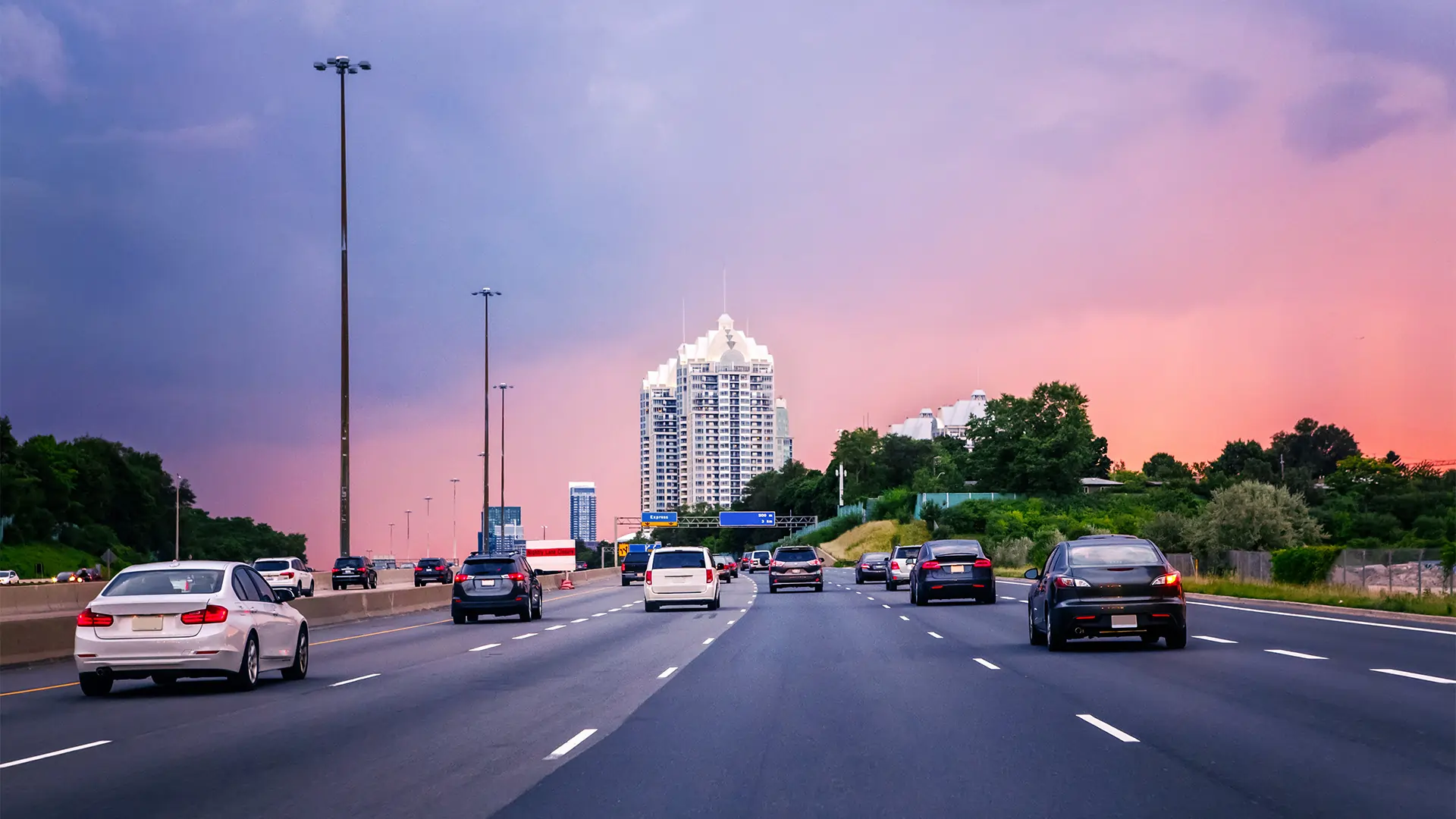 Cars driving down a highway in Toronto.