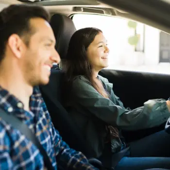 Teen driving with their parent.