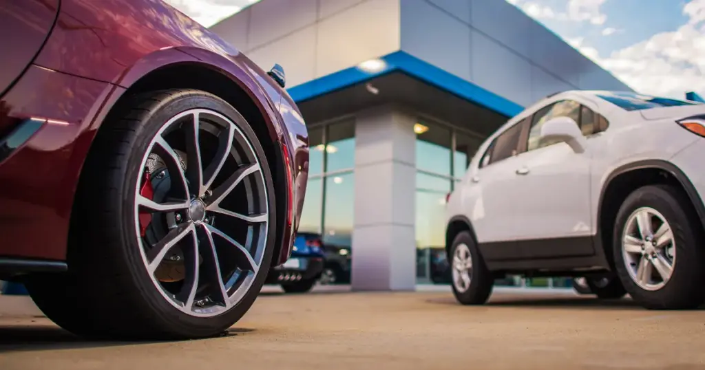 New cars at an auto dealership.