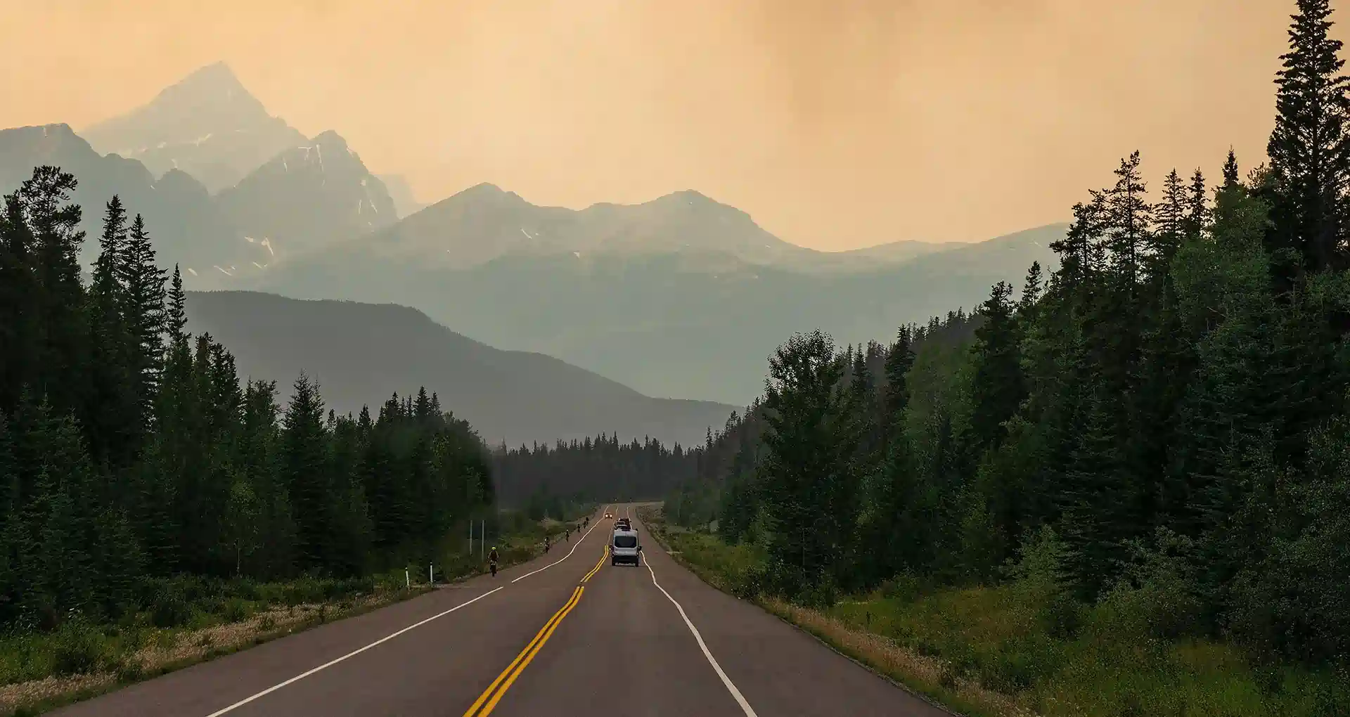 Wildfire smoke along road.