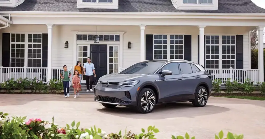 Family with their Volkswagen ID4.